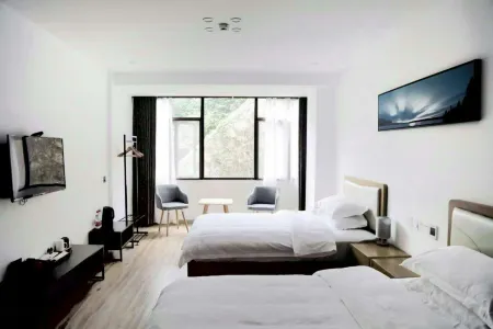 wenchenghanshexiximinsu Отели рядом с достопримечательностью «Longqiyuan»