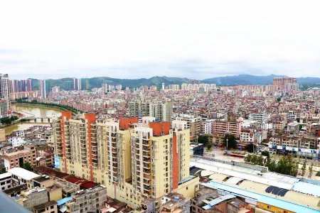 Wei Xi Deng Business apartments Отели рядом с достопримечательностью «Wenchang College»