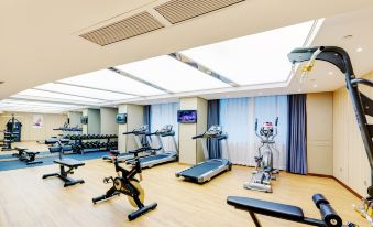 There is a spacious room in the center of the hotel with multiple exercise equipment and an indoor fitness center at Ocean Hotel