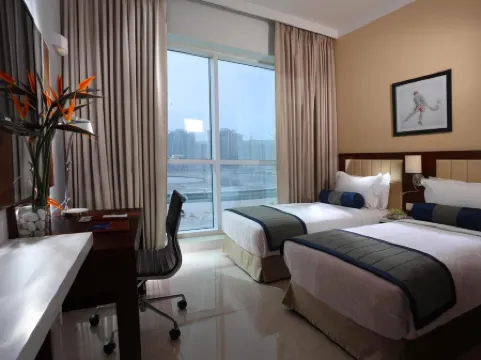 Treppan Hotel & Suites by Fakhruddin Отели рядом с достопримечательностью «Дубай Спортс Сити»