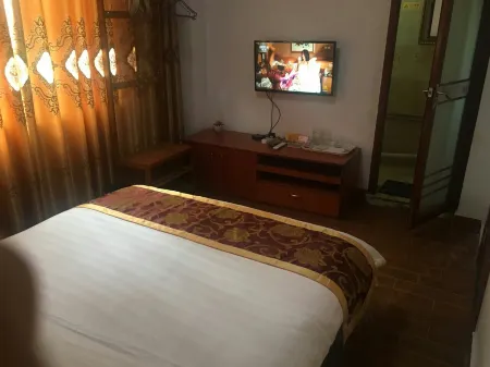 Wenchuan Manxuan Inn Отели рядом с достопримечательностью «Baihua Bridge Relic Site»