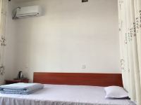 蓬莱新泰旅馆(烟台国际机场店) - 特惠大床房（公共卫浴）