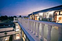 Garden Memory Guesthouse Отели рядом с достопримечательностью «Пекинская Институт образования (Цзянцинская кафедральная кафед»