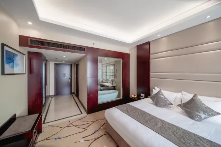 Damei International Hotel Отели рядом со станцией Junan Railway Station