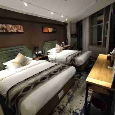 仁壽萬業陽光飯店 Rooms