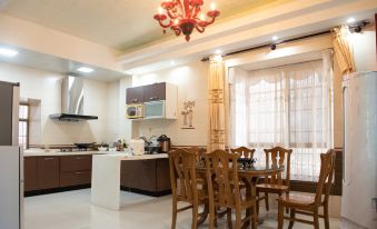 Dongxing Guomen e Homestay