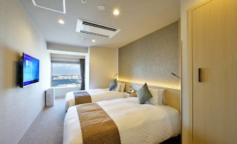 Odysis Suites Osaka Airport Hotel