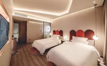 Yishe Qingju Hotel (Dengzhou Xinglin Rehabilitation Hospital) Отели рядом с достопримечательностью «Nanyang Vocational College of Science and Technology»