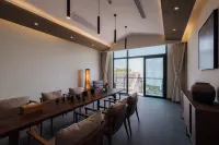 Jiuqi Haishang Taoyuanli Hotel