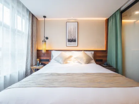 Yiman Hotel (Xitang Songzi Laifengqiao) Отели в г. Цзяшань