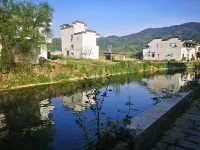 Floral Hotel · Mount Huangshan Huanxiu Building B&B (Chengkan Scenic Spot Store) Hotels in Huangshan