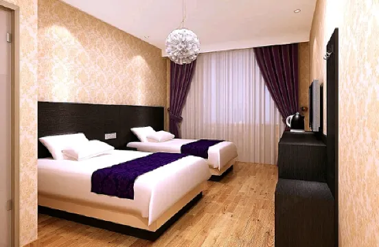 Urban Dafah Hotel (Harbin University of Commerce South Campus) Отели рядом с достопримечательностью «Tian Jiabing Gymnasium»