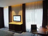 Xinchang Wozhou Junyi Hotel