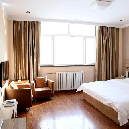 Chongli Pengyuan Business Hotel (Celebration Square) Отели рядом с достопримечательностью «Центральная больница в районе Цуйли»