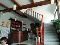 Jixi Baobao Inn - Losmen