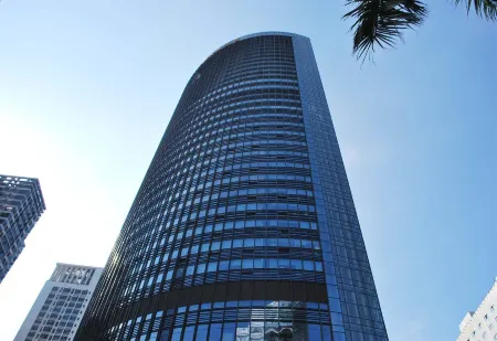 Shenzhen Huaqiang Plaza hotel (Huaqiangbei Metro Station) Отели рядом с достопримечательностью «CPC Shenzhen Committee Party School»