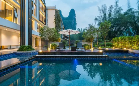 Lihua Chen's Garden Hotel Отели рядом с достопримечательностью «Xingping Wharf»