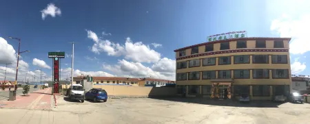 Dingyi Hotel Hongyuan Отели рядом с достопримечательностью «Ruixiang Tower»