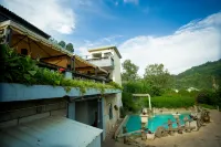 Red River Valley Hot Spring Resort Mile Hotel di Mil
