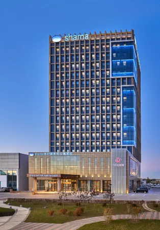 Shama Daqing Serviced Apartment Hotel Отели рядом с достопримечательностью «Daqing Times Square»