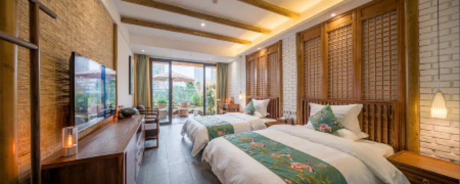 Wansheng Taoyao Homestay Отели рядом с достопримечательностью «Nantong Mining Industry Company Workers Culture & Sport Center»