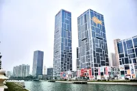เซอร์วิสอพาร์ตเมนต์ไห่จือซิง จัตุรัสซิงไห่ ต้าเหลียน โรงแรมในXinghai Square