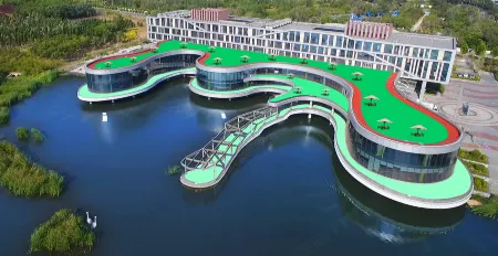 Nanhu Football Theme Hotel Отели в г. Таншань