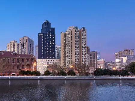 base SUHE Serviced Apartment Отели рядом с достопримечательностью «Shanghai Huang Daopo Tomb and Ancestral Hall»