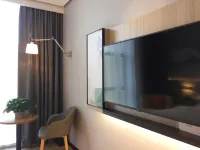 聚信悅途飯店（鬆滋新江口鎮店）