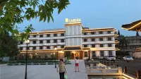 Feilong Holiday Hotel Hotels near Guoen Temple