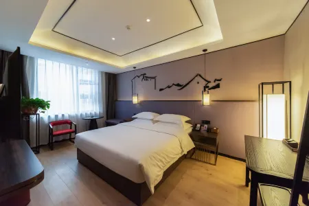 Xinyang Moushang Living Hote Отели рядом с достопримечательностью «Xinyang Normal University»