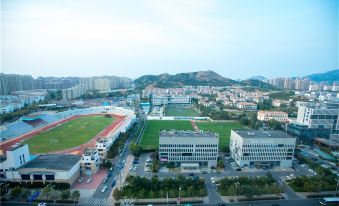 Qing Dao Mu En LOFT oxygen apartment - Housity