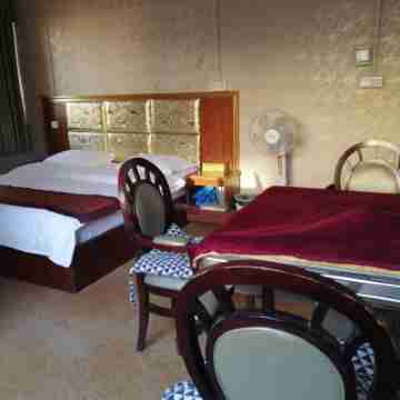 Xingguang Business Hostel Rooms