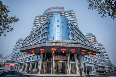 Danjiangkou Guanlan International Hotel（Hanjiang Avenue storefront） Отели в г. Даньцзянкоу