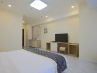 鸡西斯维登酒店式公寓(万达) - 舒适大床房