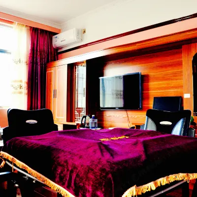 Yulong Changzheng Business Hotel Hotels near Stone Drum (Shigu) Town