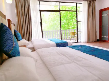 Guilin Guzhen Inn (Dawei Guzhen Inn) Отели рядом с достопримечательностью «Li River Craftsman Village»