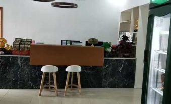 Baojing Wenfeng Business Hotel