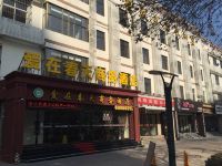 天津爱在春天商务酒店