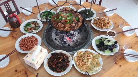 Paradise Village Ice Creek Hotel Отели рядом с достопримечательностью «Baima Canyon»