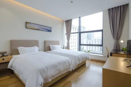 Maoyuan Qiluo Pushi Apartment Hotel