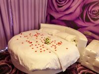 广州铂格主题公寓 - 浪漫情侣圆床房