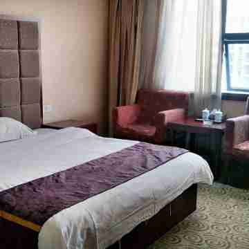 Tianyi Holiday Hotel Rooms