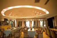 Manzhou International Hotel (Nan County Meixi)