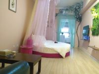 驿旅阳光主题公寓(许昌新田360店) - 春风十里主题房
