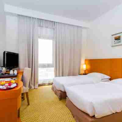 BM Acacia Hotel and Apartments Rooms