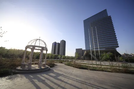 Henghe Huaxing Hotel Отели рядом с достопримечательностью «Shihezi University - South District»