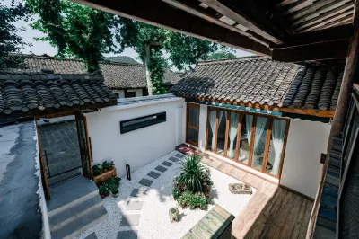 Siyaojia Zijin Hostel Hôtels à proximité de : Langzhong Passenger Transportation Center