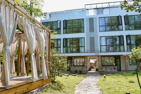 Floral Hotel·YixingShangyuan Boutique Hotel Отели рядом с достопримечательностью «Shanjuan Cave»