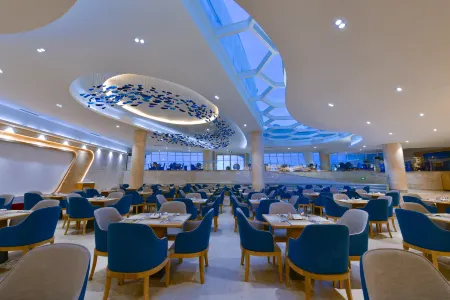 Twin Moon Bay Xianghai Hot Spring Holiday Hotel Отели рядом с достопримечательностью «Turtle National Reserve Areas»